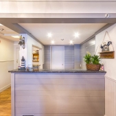 Our reception desk for the Inn is located inside The Lighthouse Restaurant.